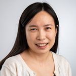 Ke Zhang portrait in front of a white background.