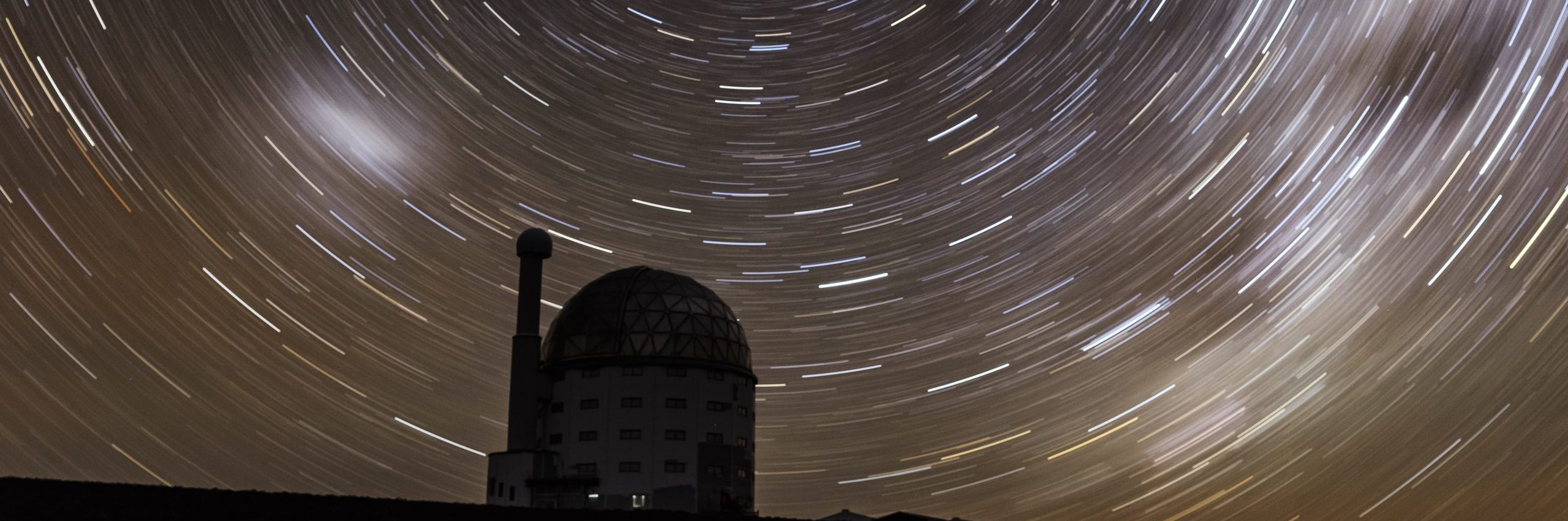 30 minute exposure photograph of the night sky above the Southern Africa Large Telescope.