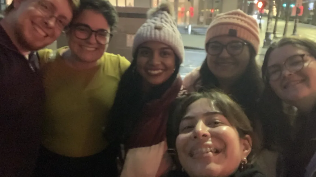 RADIAL students pose for a selfie outside in winter.