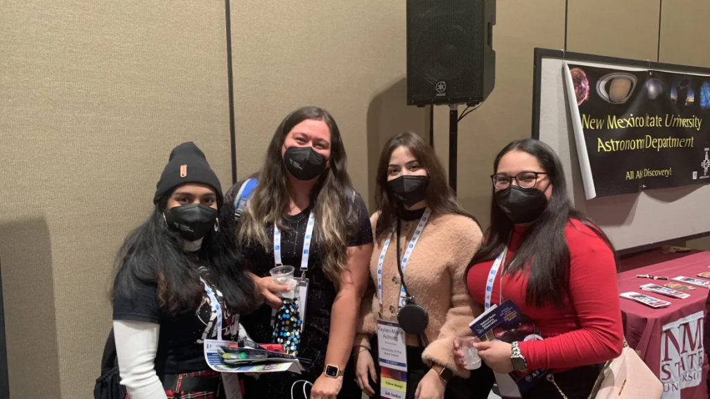 RADIAL students pose for a photo, all wearing face coverings.